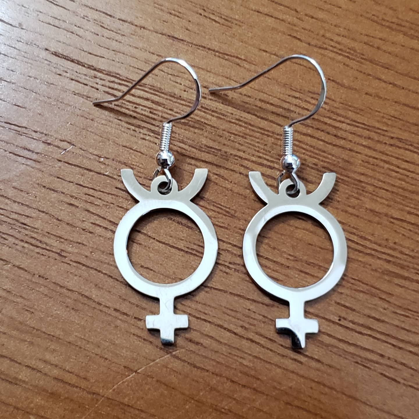 Mercury symbol earrings