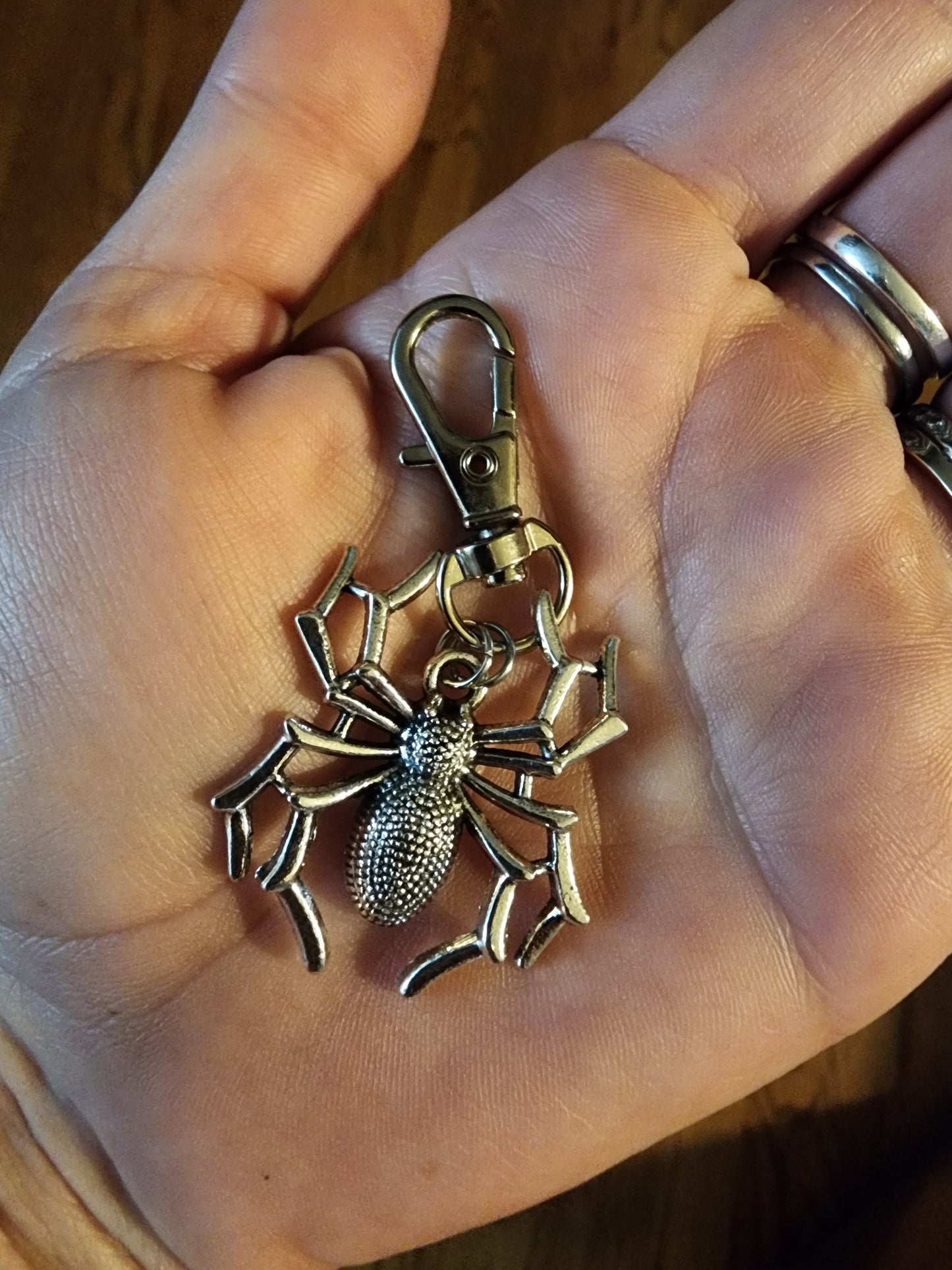 Spider zipper pull or key clip