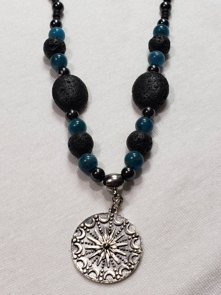 Sterling silver Sun and moon mandala on lava, apatite and hematite necklace