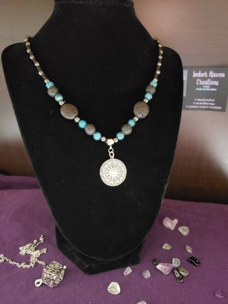 Sterling silver Sun and moon mandala on lava, apatite and hematite necklace