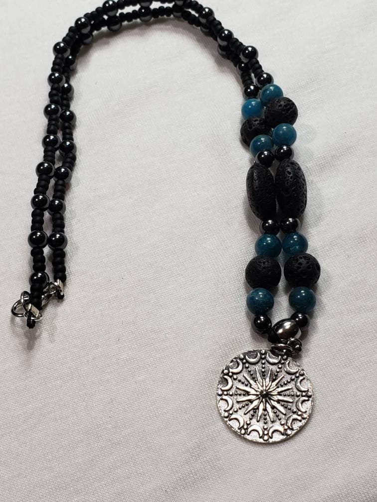 Sterling silver Sun and moon mandala on lava, apatite and hematite necklace