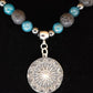 Sterling silver Sun and moon mandala on lava, apatite and hematite necklace