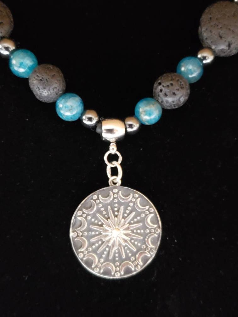 Sterling silver Sun and moon mandala on lava, apatite and hematite necklace