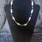 Howlite and Dumortierite necklace with Hematite and acrylic accents.