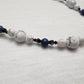 Howlite and Dumortierite necklace with Hematite and acrylic accents.