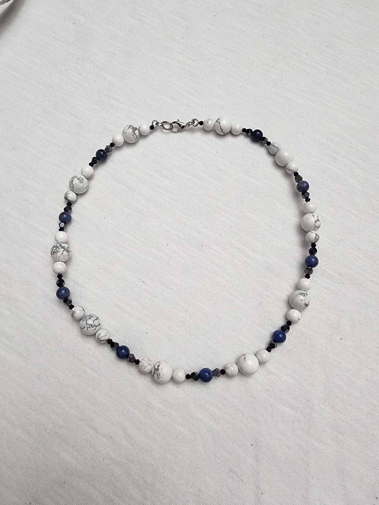 Howlite and Dumortierite necklace with Hematite and acrylic accents.