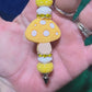 Yellow mushroom keychain